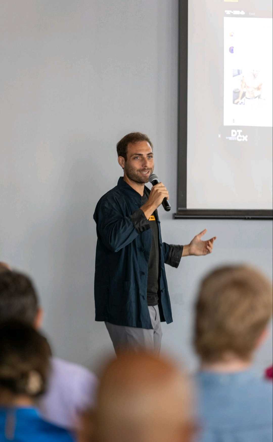 Roy speaking at DTCx